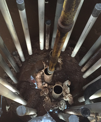 Drilled shaft anomaly removal with hydro demolition