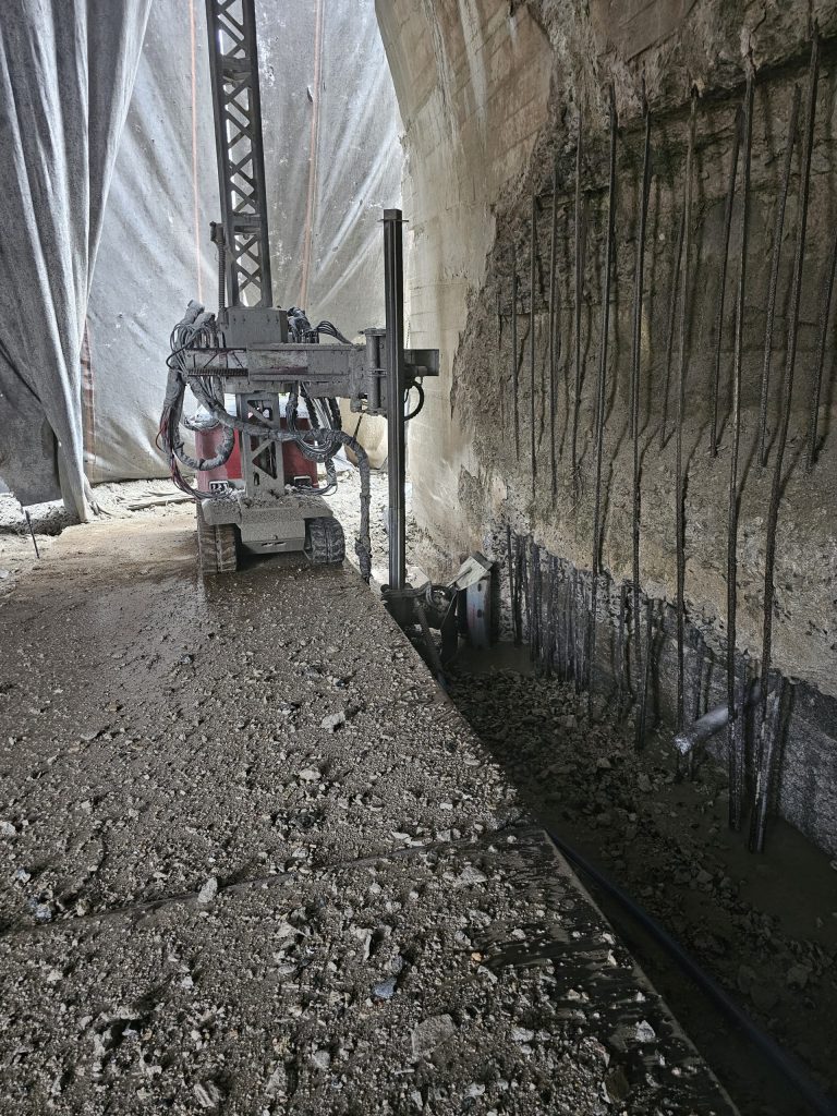 710v robot performing below-grade hydrodemolition.