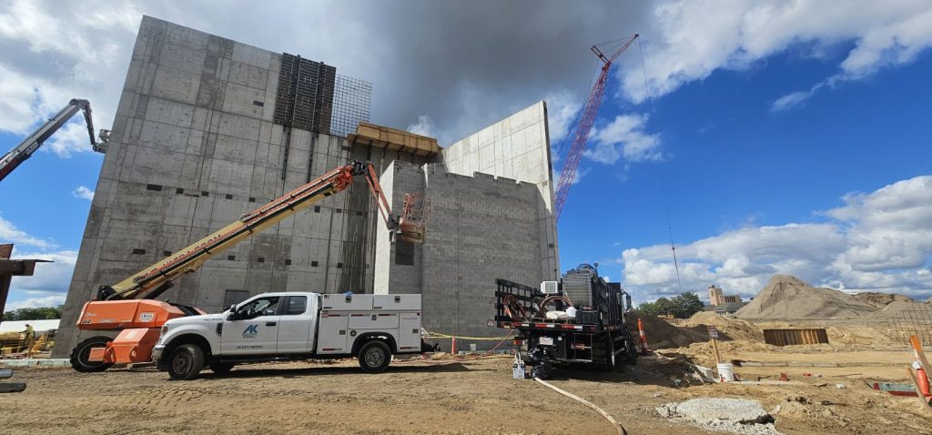 An AK truck with a boom lift to bring operators up to the necessary level.