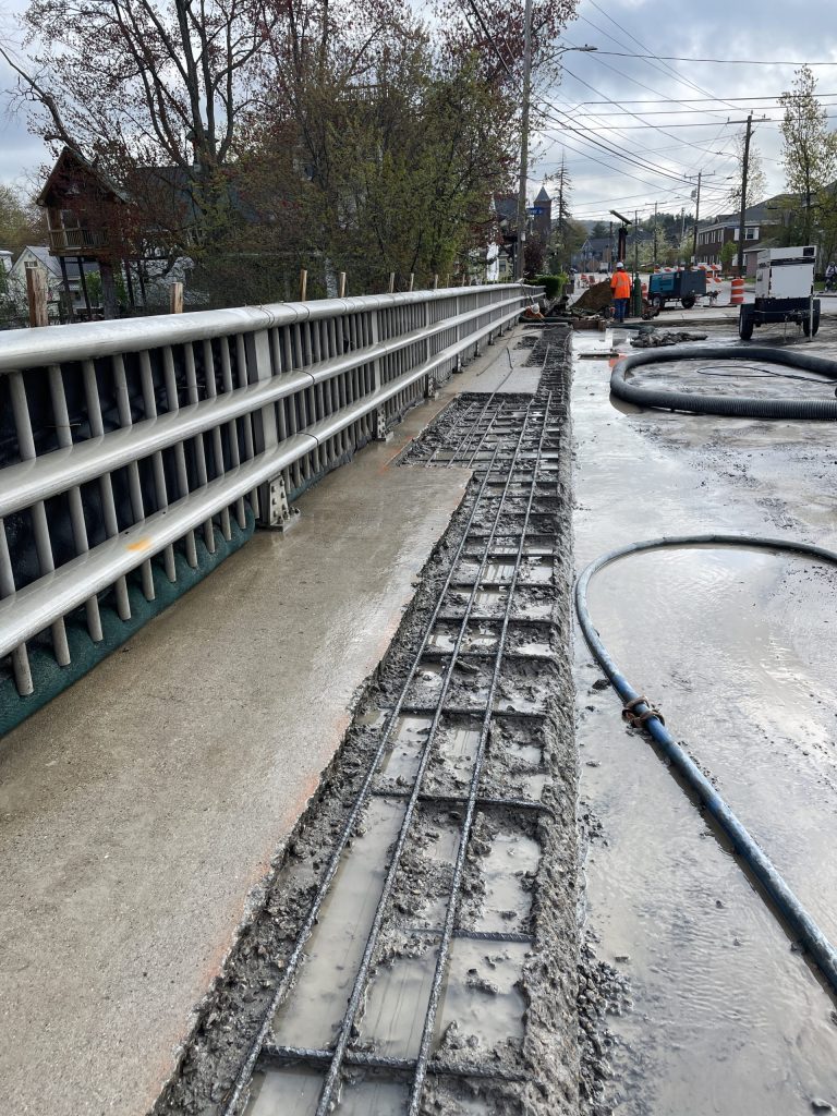 Exposed rebar after hydrodemolition for bridge deck repair.