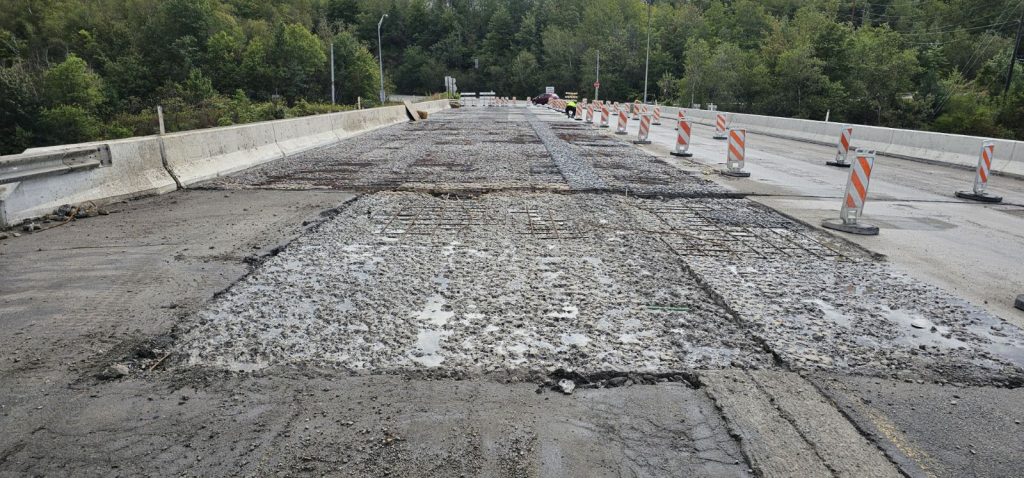 The surface and exposed rebar after hydrodemolition.